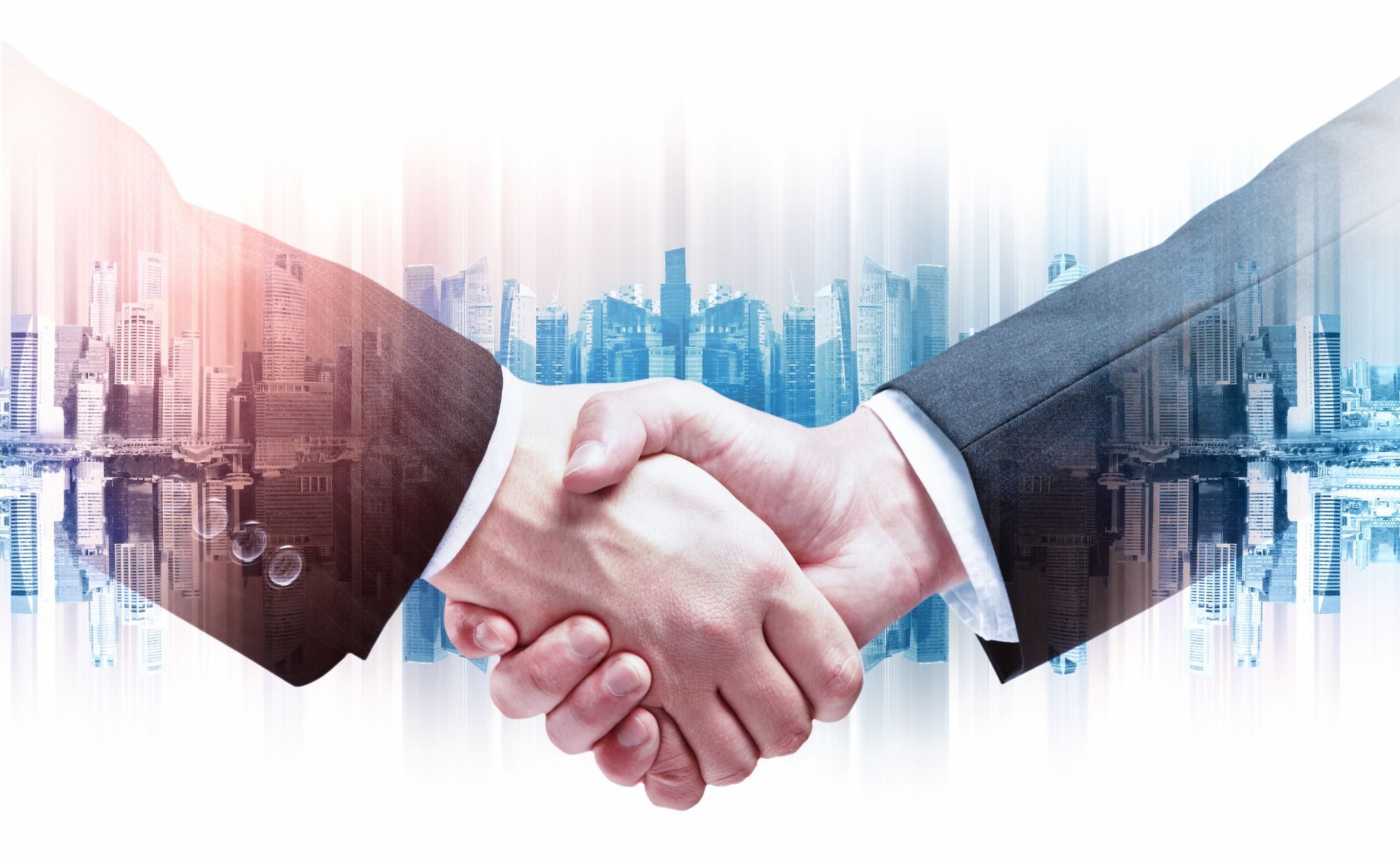 2 homme qui se sert la main Hexagon Conseil & Patrimoine
